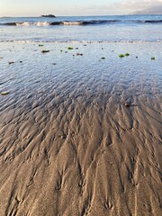 the texture of the sand of the pacific sea