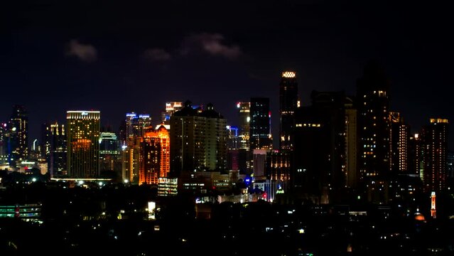 Timelapse of Jakarta city panorama at night. Indonesia.