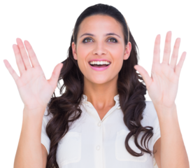 Pretty brunette holding up hands