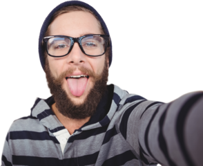 Portrait of happy hipster sticking out tongue