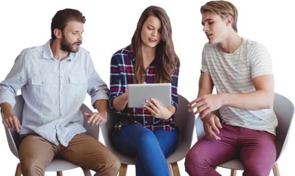 Business people discussing over tablet while sitting on chair