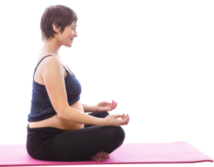 Pregnent woman sitting on mat in lotus pose