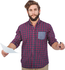 Portrait of confident hipster holding pen and paper