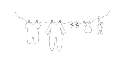 Cute kids clothing hanging on a rope drawn in one line. Sketch. Continuous line drawing baby things. Hand drawn vector illustration in minimalist style. 