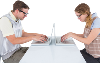 Geeky hipster couple using laptop
