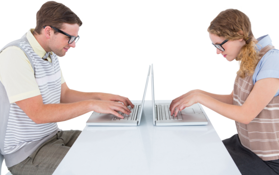 Geeky hipster couple using laptop