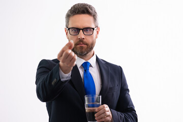 Tired man suffering from headache, exhausted with closed eyes touching head, relieving pain, migraine. Business problems. Man taking a medicine pill from headache migraine.