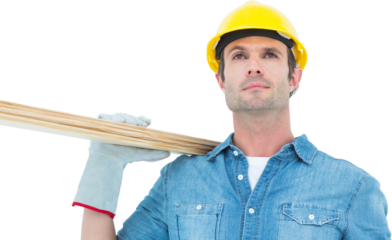 Worker carrying wooden planks