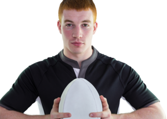 Smiling rugby player holding a rugby ball