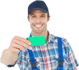 Happy plumber showing green card
