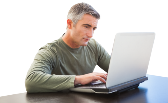 Man using laptop on desk