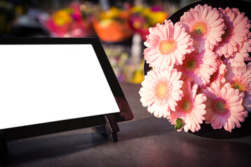 Digital tablet with pink flowers