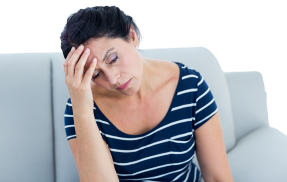 Unhappy woman sitting on the couch