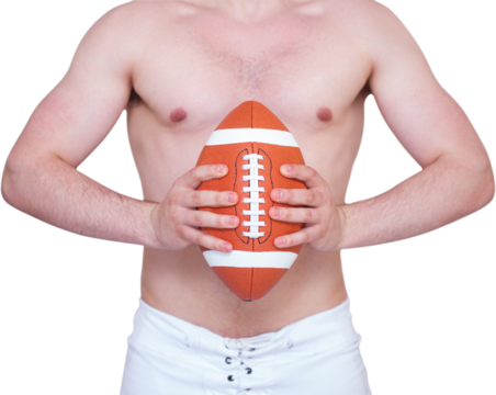 Shirtless american football player holding a ball