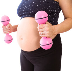 Midsection of pregnant woman lifting dumbbells