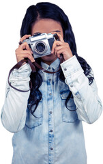 Asian woman taking picture with digital camera