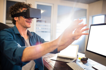 Fototapeta premium Businessman wearing virtual glasses