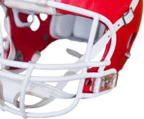 Deurstickers Amerikaanse plekken An american football helmet on the field