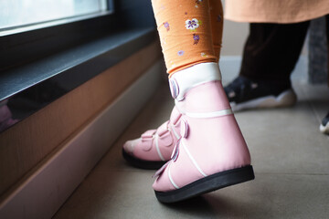 Child cerebral palsy disability, legs orthosis.