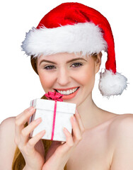 Obraz premium Pretty girl in santa costume holding gift box