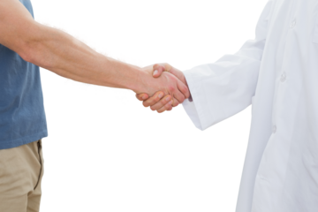 Mid section of a doctor and patient shaking hands