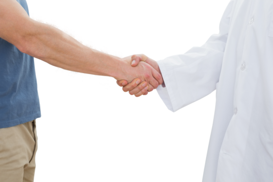 Mid section of a doctor and patient shaking hands