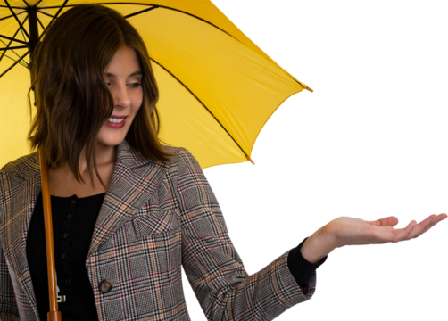 Woman holding umbrella while gesturing