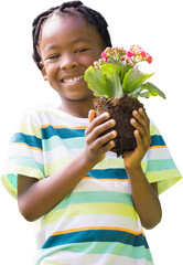 Happy boy holding potted plant