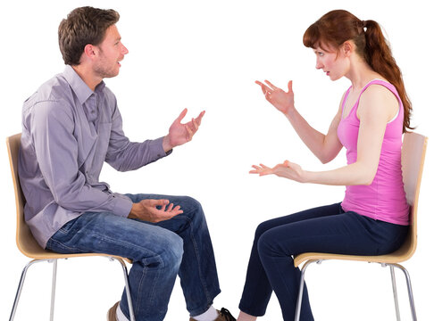 Sitting couple having an argument