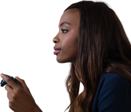 Side view of businesswoman playing video game