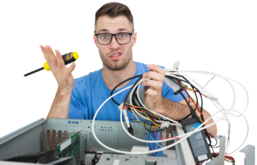 Portrait of confused it professional with screw driver and cables in front of open cpu