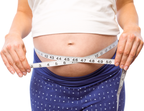 Pregnant woman measuring her bump