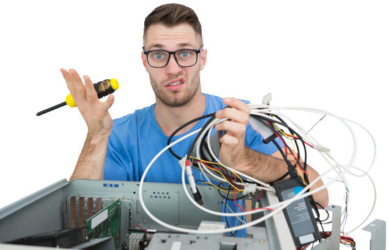 Portrait of confused it professional with screw driver and cables in front of open cpu