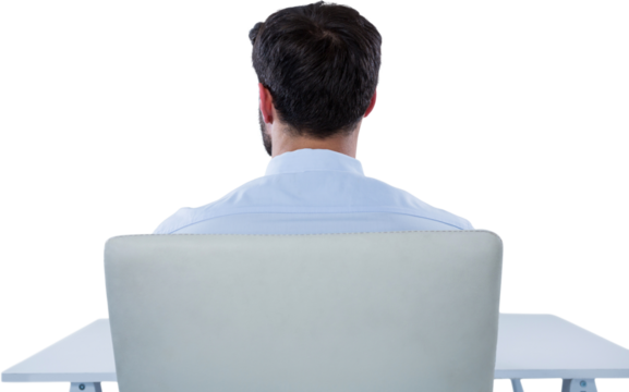 Rear view of businessman sitting on chair - Powered by Adobe