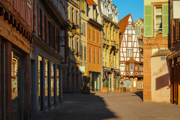Fototapeta na wymiar traditional half-timbered houses on street in Colmar, Alsace region, France
