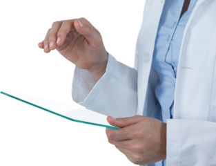 Midsection of female doctor using digital tablet