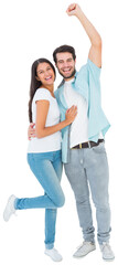 Happy casual couple cheering at camera
