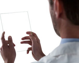 Male doctor using glass digital tablet
