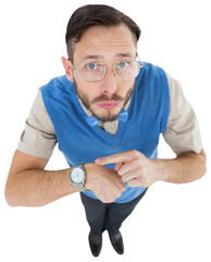 Geeky hipster looking at camera pointing at watch