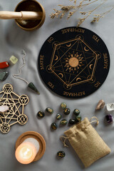 Crystal grid, set of rune stones, pendulum boardfor divination and fortune telling. Mystic still...