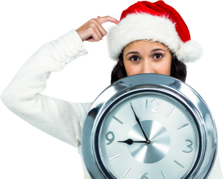 Woman wearing christmas hat holding clock