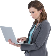 Businesswoman typing on laptop computer