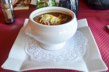 Bowl with onion soup (French food).