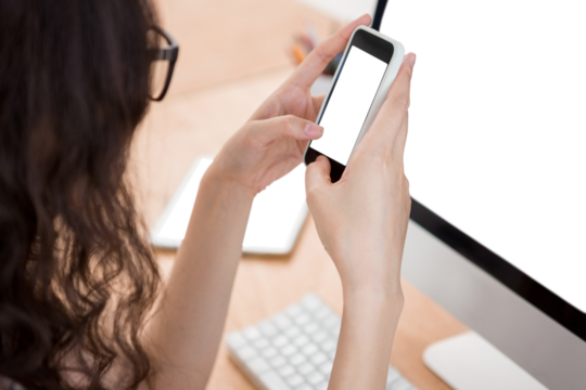 A woman is using her smartphone  - Powered by Adobe