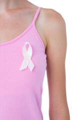 Woman wearing pink ribbon for breast cancer awareness