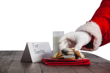 Close-up of santa claus taking cookies