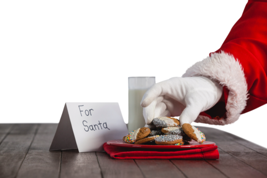 Close-up of santa claus taking cookies - Powered by Adobe