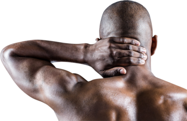 Rear view of athlete massaging neck