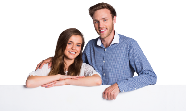 Happy young couple with blank board - Powered by Adobe