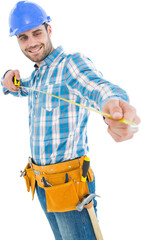 Happy repairman looking at measure tape